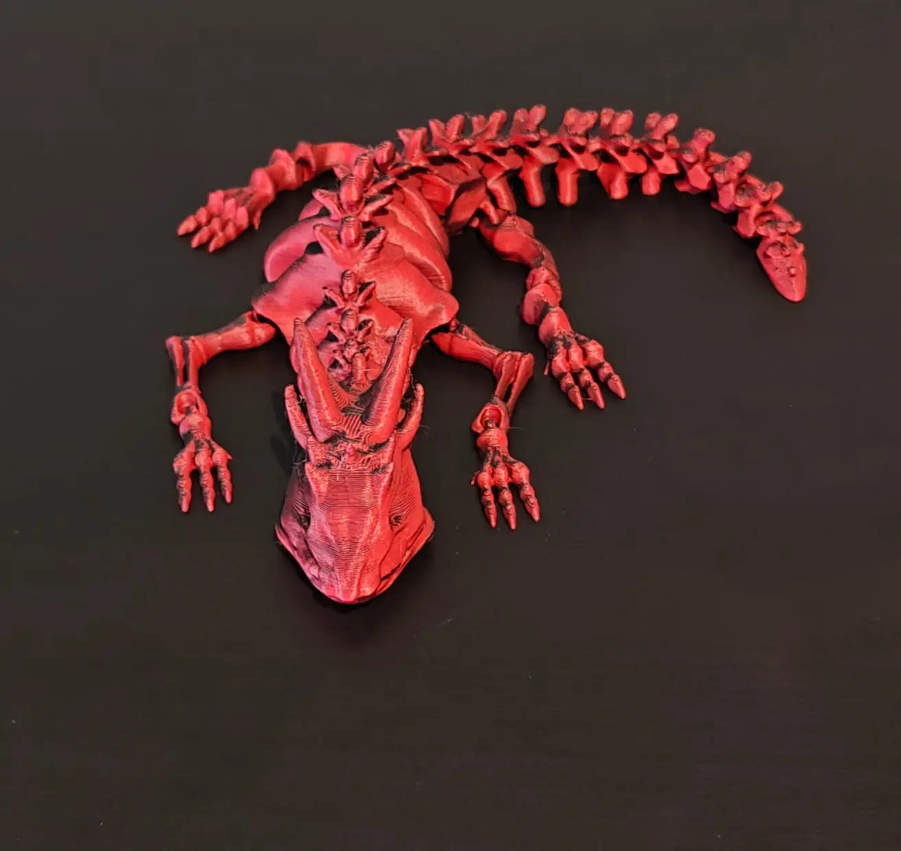 DRAGONIX - "Pete" väriä vaihtava Fidget lohikäärmeen luuranko (S 16cm), (M 24cm), (L 36cm) PRINT NORDICA OY