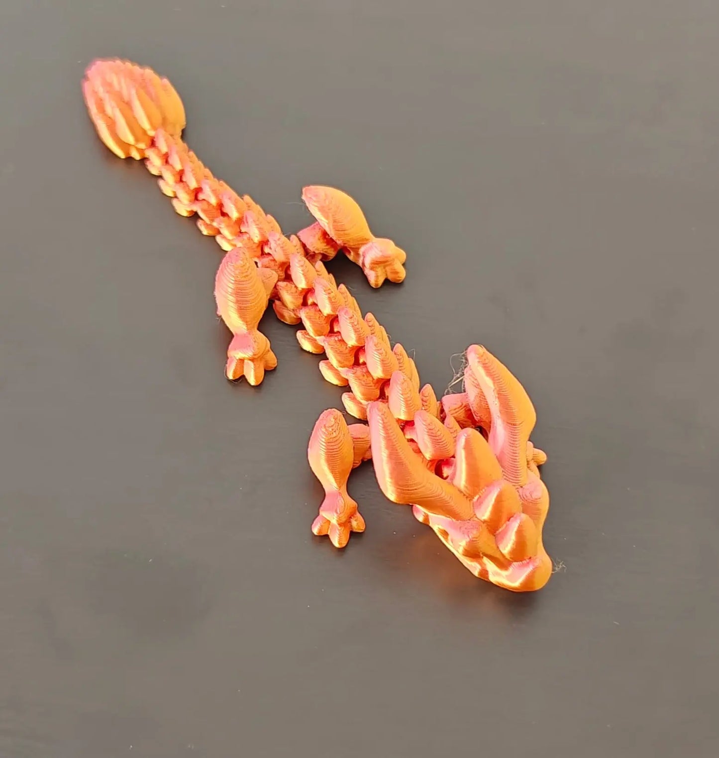 DRAGONIX - "Tarmo" Fidget lohikäärme 15/19/25cm PRINT NORDICA OY