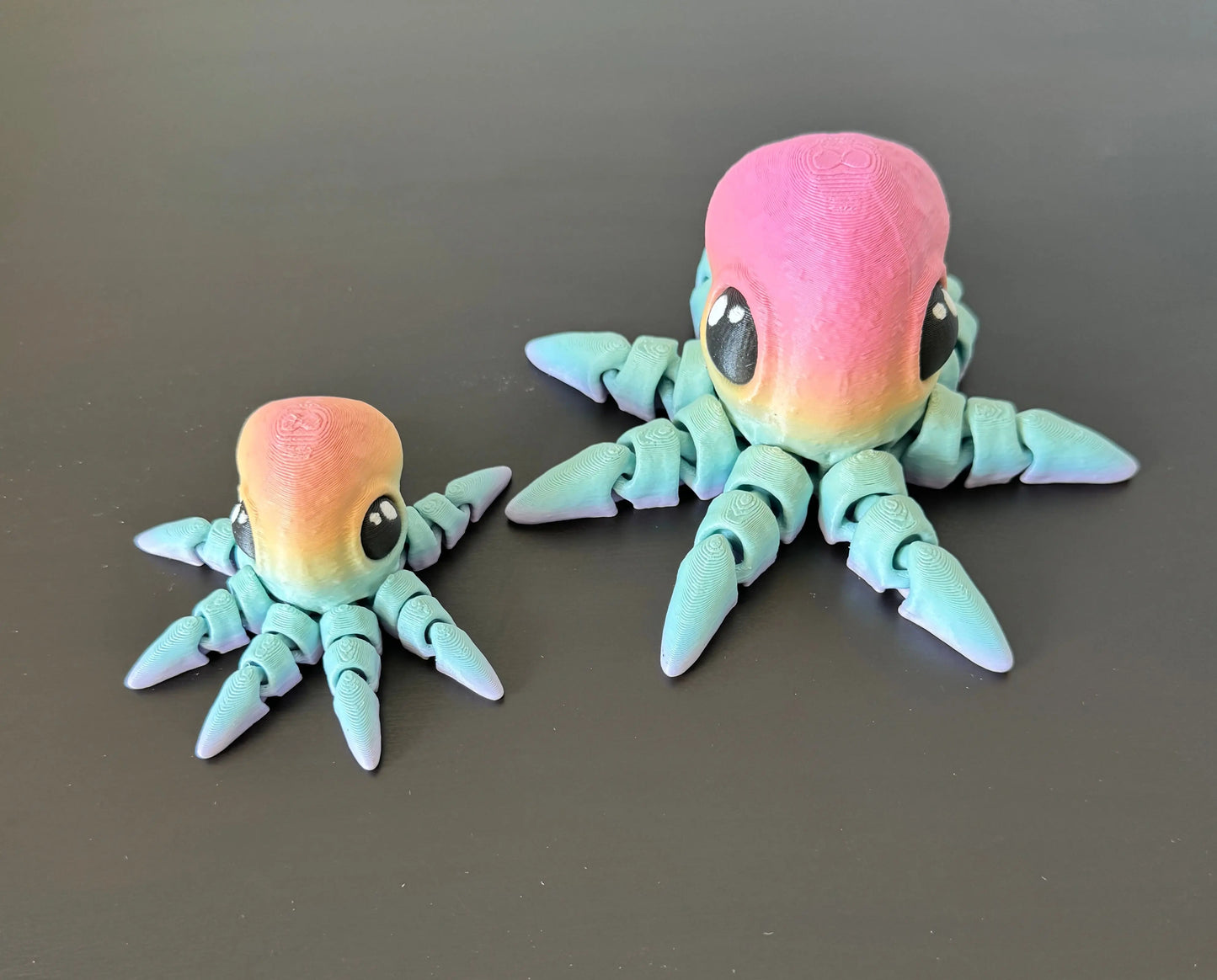 DRAGONIX - "Remu" Fidget Mustekala 8/13cm PRINT NORDICA OY