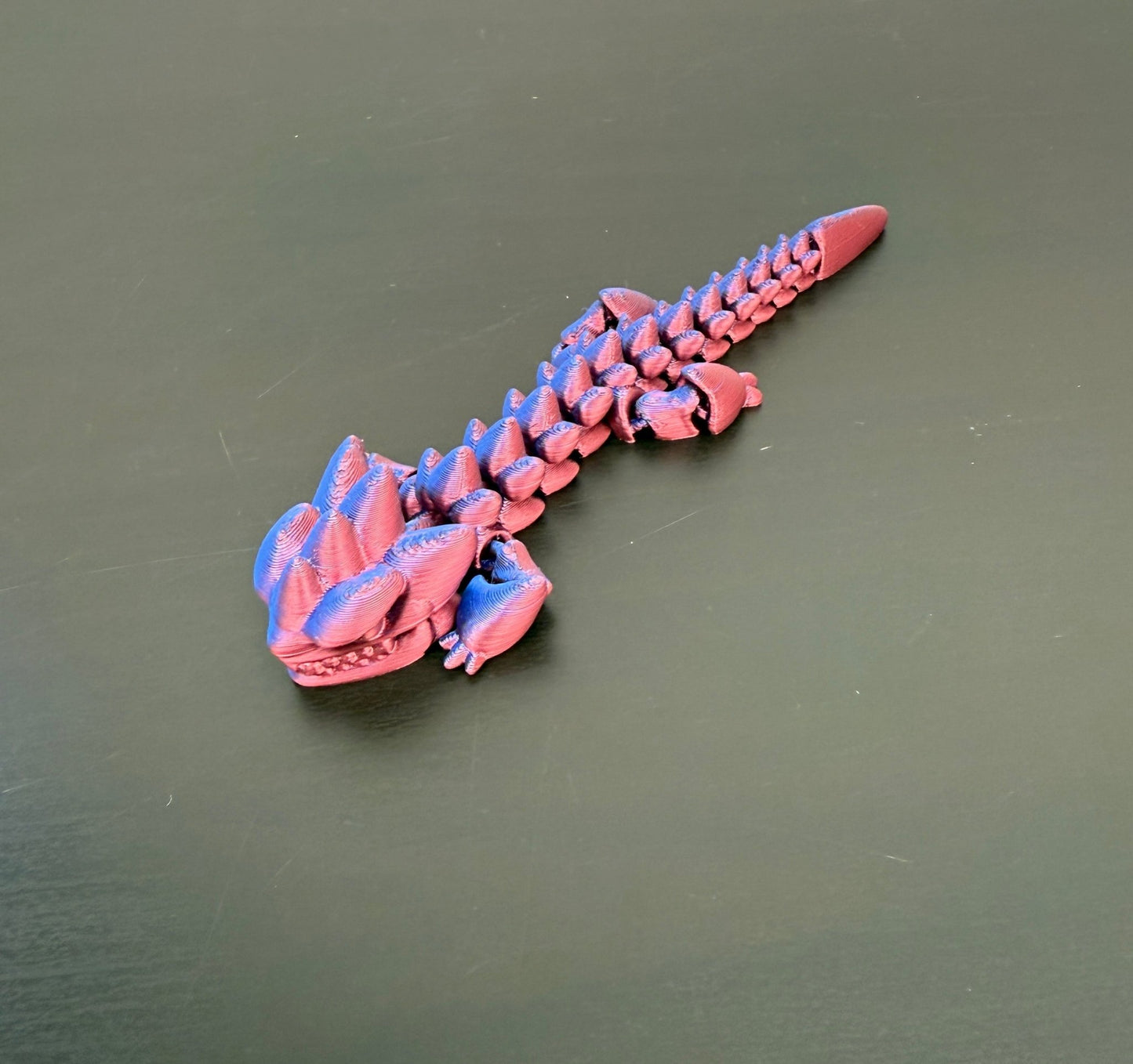 DRAGONIX - "Kalevi" Fidget lohikäärme 15/19/25cm - PRINT NORDICA