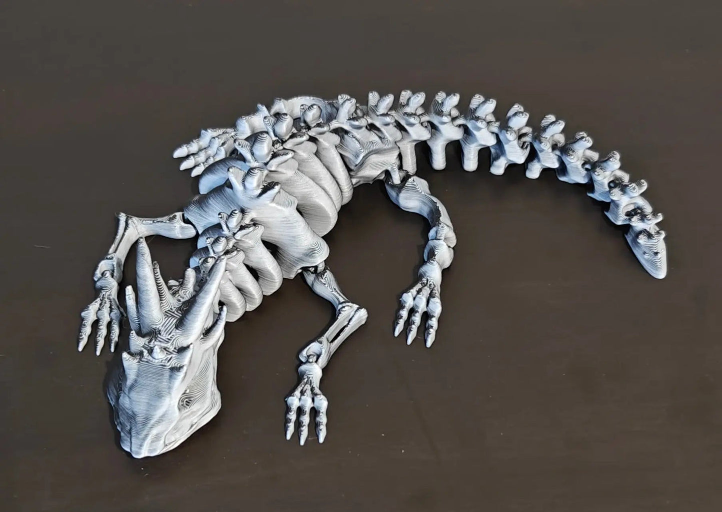 DRAGONIX - "Pete" väriä vaihtava Fidget lohikäärmeen luuranko (S 16cm), (M 24cm), (L 36cm) - PRINT NORDICA